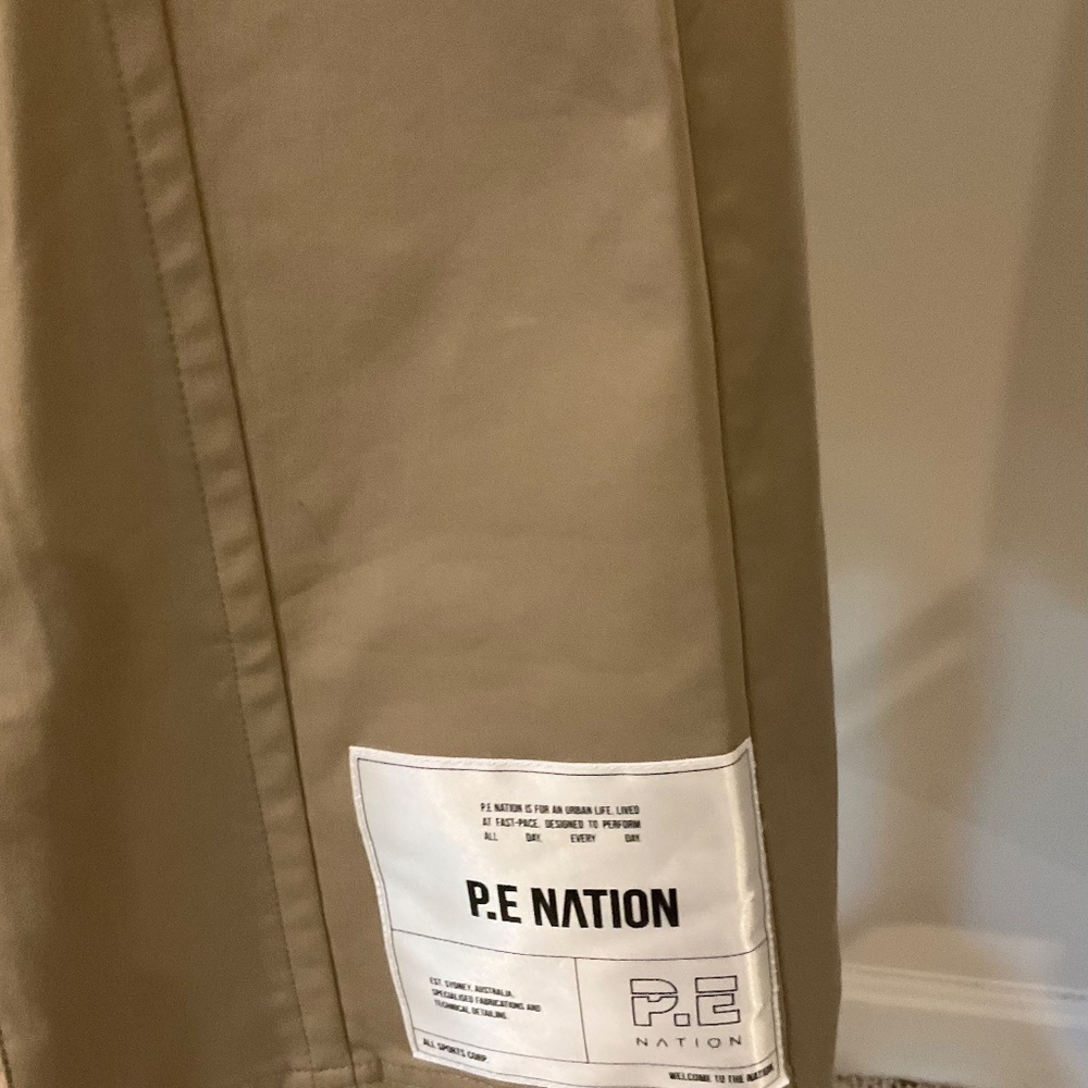 P.E NATION PROPEL SKIRT. SIZE: XS, BROWN/NEON YELLOW. - Picture 10 of 14